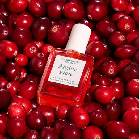 Pielęgnacyjny lakier do paznokci Active Glow™ Cranberry Manucurist