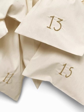 Kalendarz adwentowy biały 24 woreczki ferm LIVING